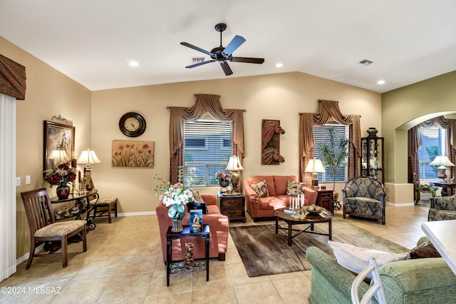 living room with ceiling fan and light tile patterned flooring