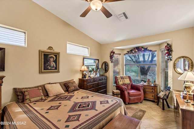 bedroom with ceiling fan and lofted ceiling