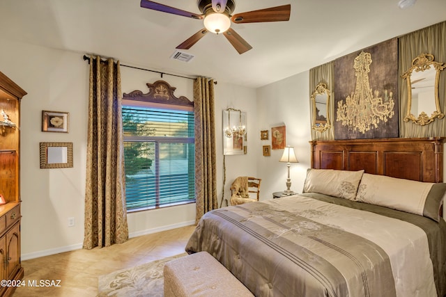 tiled bedroom featuring ceiling fan