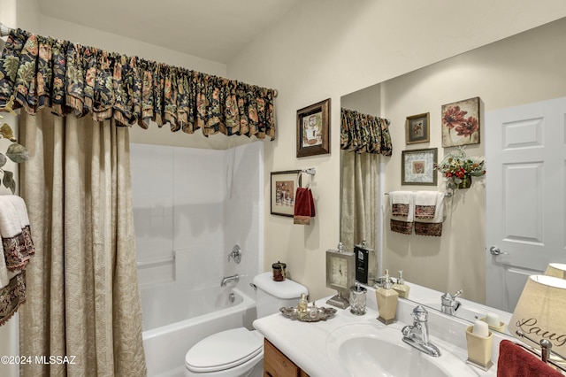 full bathroom featuring vanity, shower / tub combo, and toilet