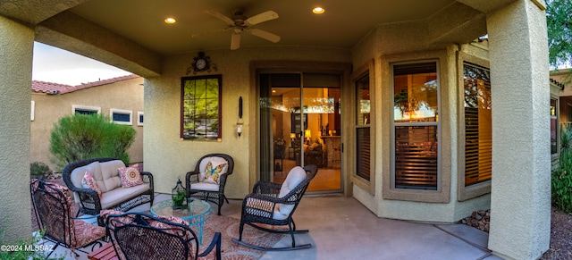 view of patio / terrace featuring ceiling fan and an outdoor hangout area