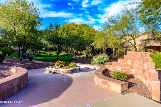 surrounding community featuring a patio