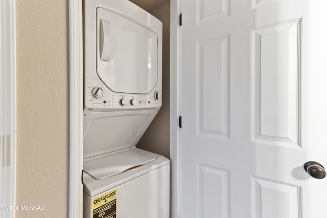 laundry room featuring stacked washer and dryer