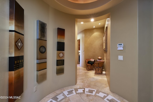 hallway featuring light tile patterned floors