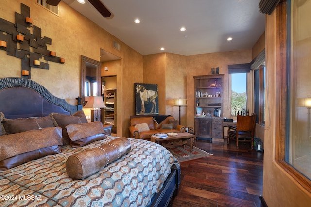 bedroom featuring dark hardwood / wood-style floors and ceiling fan