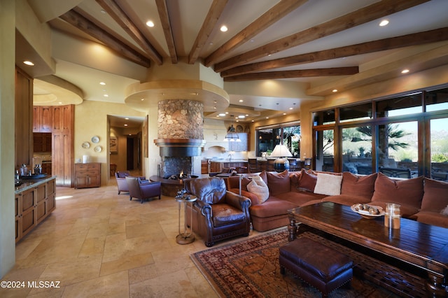 living room featuring beam ceiling