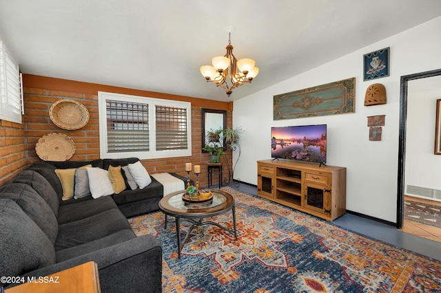 living room with vaulted ceiling and an inviting chandelier