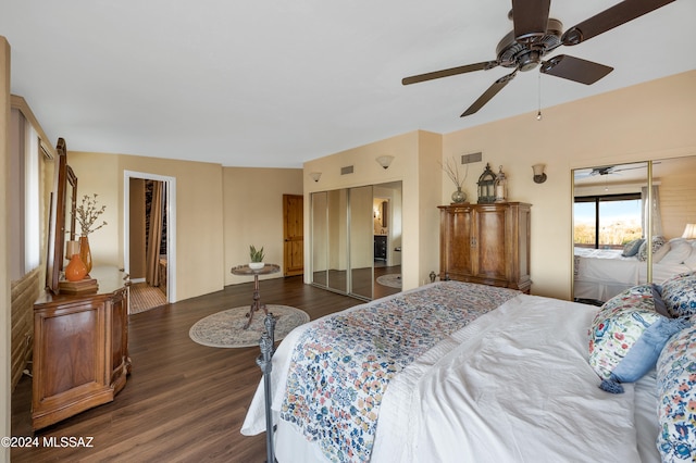 bedroom featuring ceiling fan and dark hardwood / wood-style floors