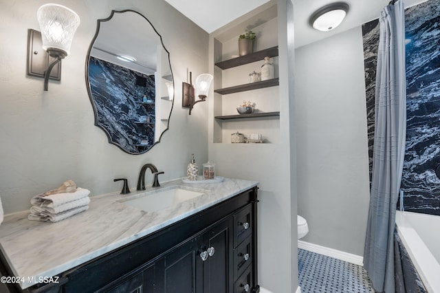 full bathroom featuring shower / tub combo, vanity, and toilet