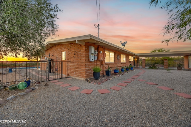 view of property exterior at dusk