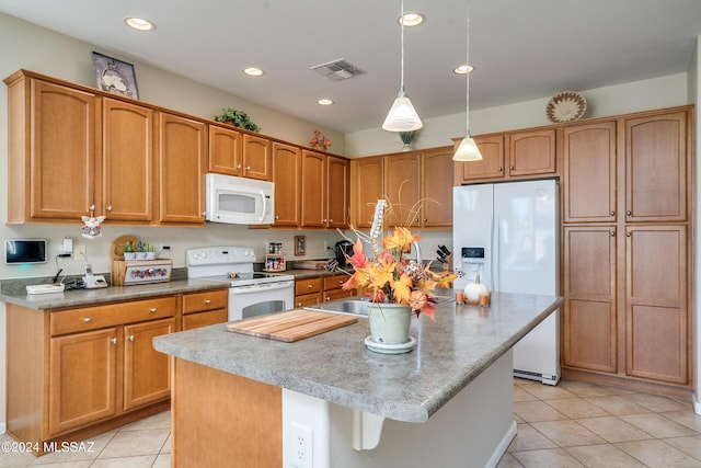 kitchen with light tile patterned floors, an island with sink, pendant lighting, and white appliances