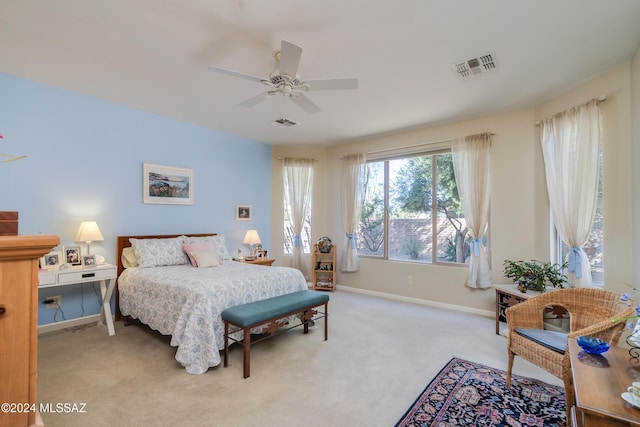 carpeted bedroom featuring ceiling fan