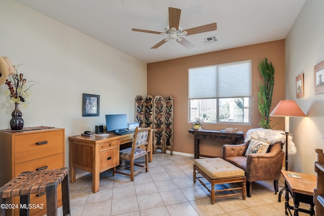 tiled office space featuring ceiling fan