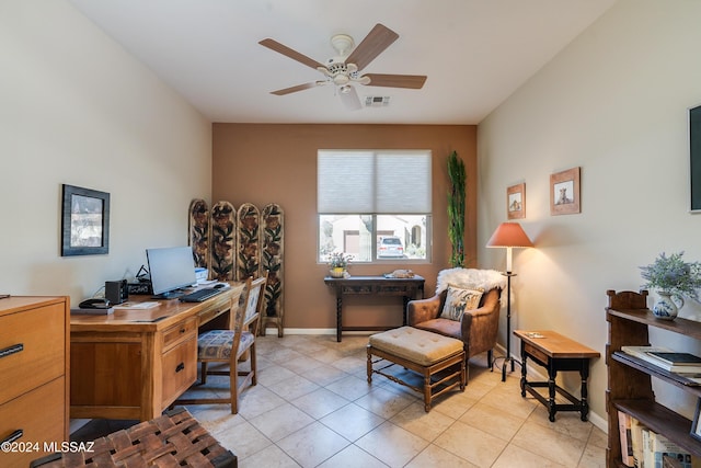 home office featuring ceiling fan and light tile patterned flooring