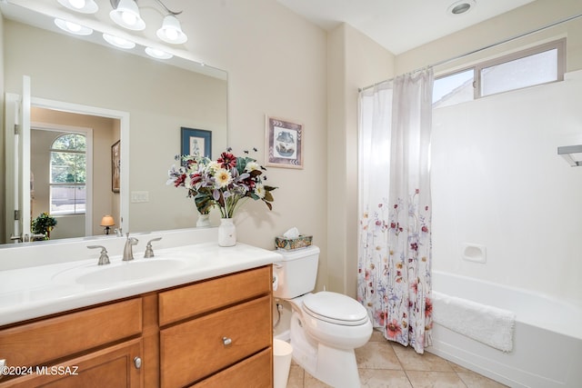 full bathroom with tile patterned floors, vanity, toilet, and shower / bathtub combination with curtain