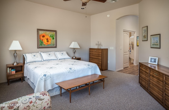 carpeted bedroom with a closet and ceiling fan