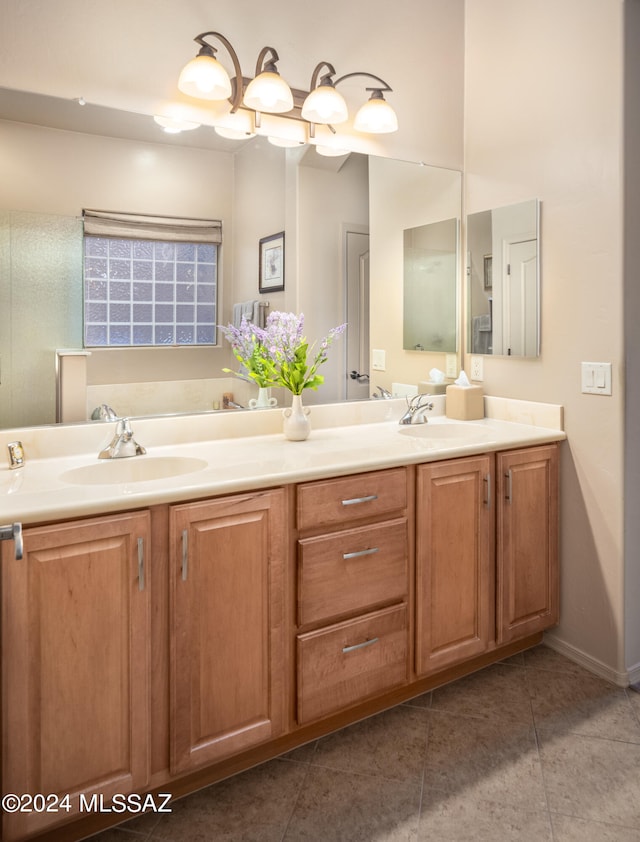 bathroom with vanity and tile patterned floors