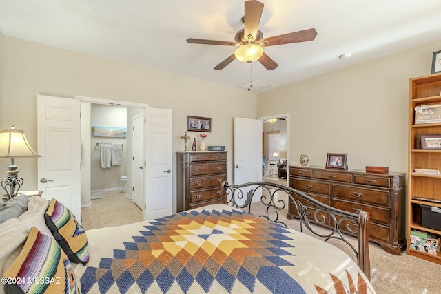 carpeted bedroom with connected bathroom and ceiling fan