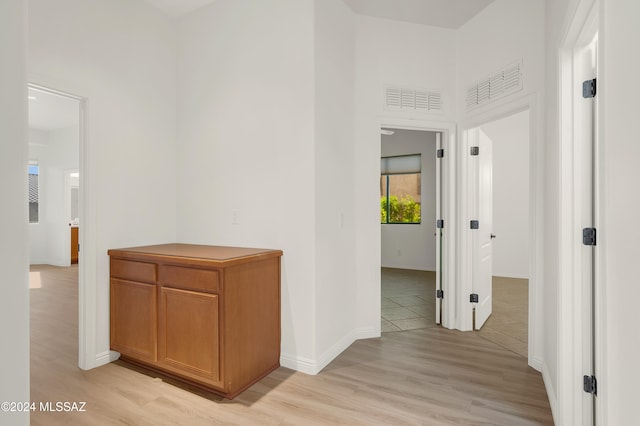 hallway featuring light hardwood / wood-style flooring