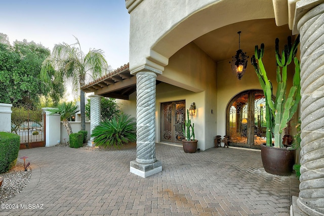 doorway to property featuring french doors