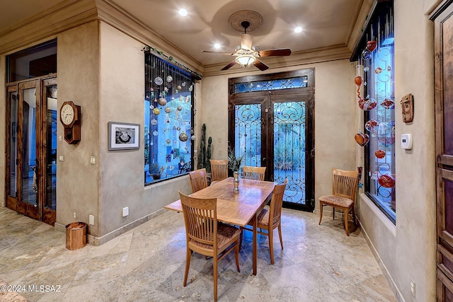 dining area featuring ornamental molding and french doors