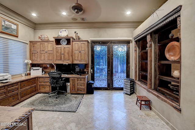 office featuring ornamental molding, built in desk, and french doors