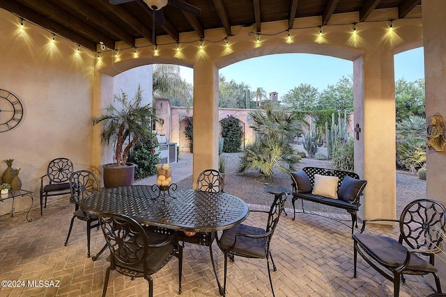 view of patio terrace at dusk