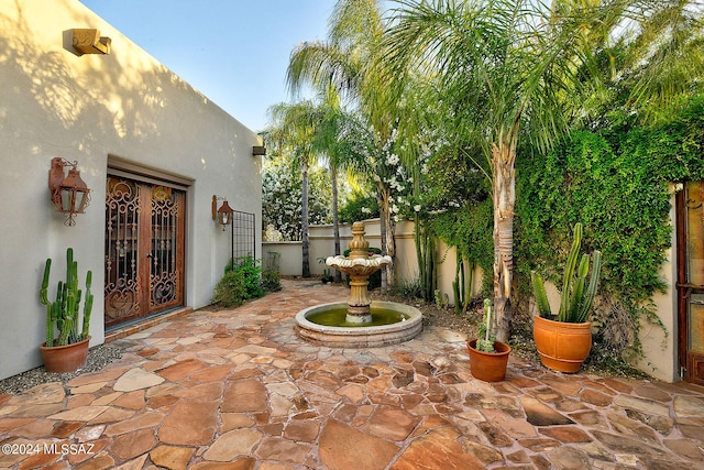 view of patio featuring french doors