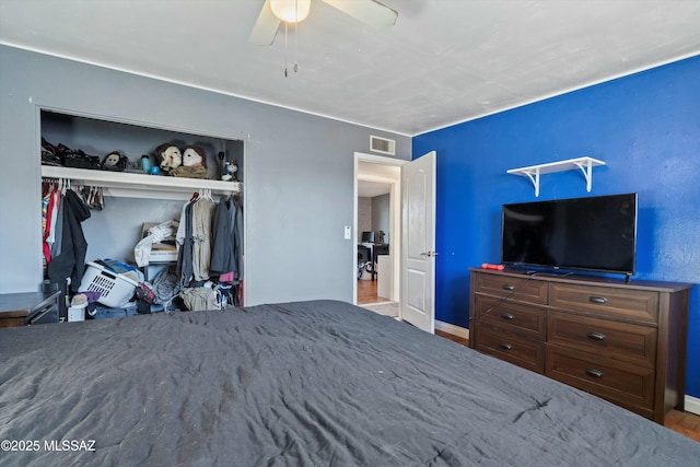 bedroom with a closet and ceiling fan