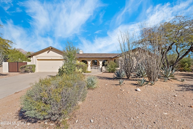 single story home featuring a garage