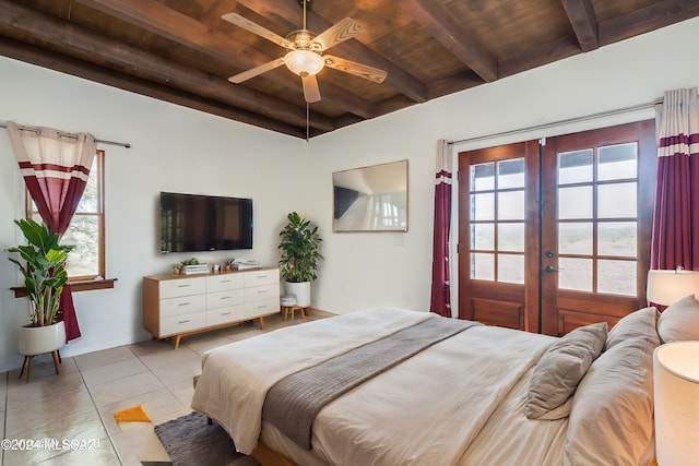 bedroom with wooden ceiling, french doors, ceiling fan, light tile patterned floors, and beam ceiling