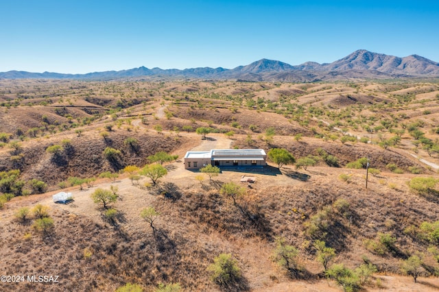 drone / aerial view featuring a mountain view