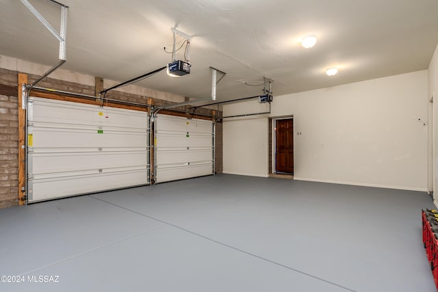 garage featuring a garage door opener