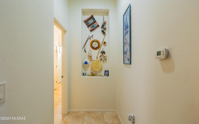 5860 S Painted Canyon Dr, Green Valley, AZ 85622 - hallway featuring baseboards and light tile patterned floors