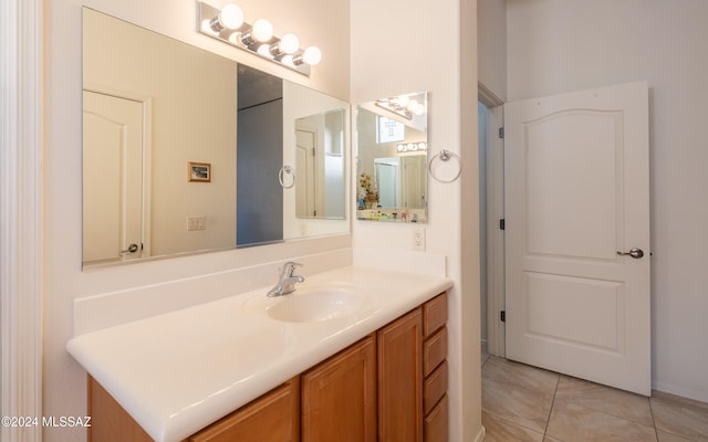 bathroom featuring vanity and tile patterned floors