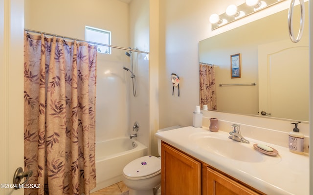 full bathroom featuring tile patterned flooring, vanity, toilet, and shower / bath combo with shower curtain