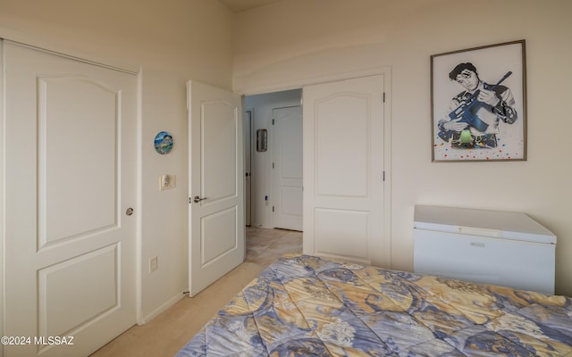 bedroom with light carpet