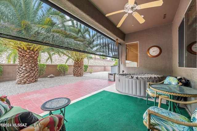 view of patio with a fenced backyard, visible vents, and ceiling fan