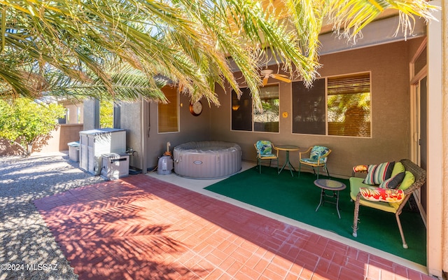 view of patio / terrace featuring fence