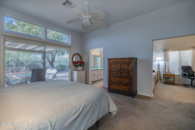 bedroom with access to outside, ceiling fan, and light carpet