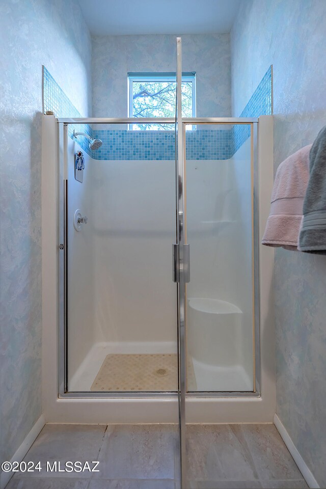 bathroom with an enclosed shower