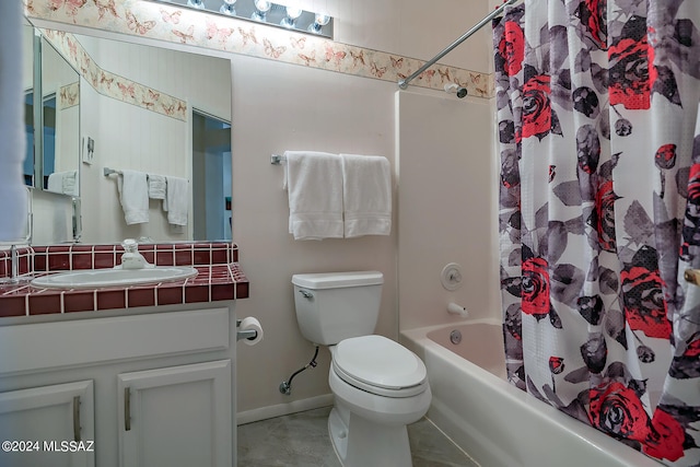 full bathroom with tile patterned flooring, vanity, shower / bath combination with curtain, and toilet