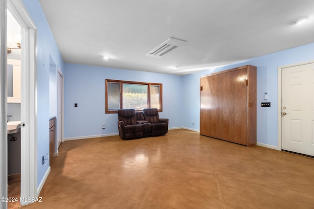 unfurnished room featuring sink