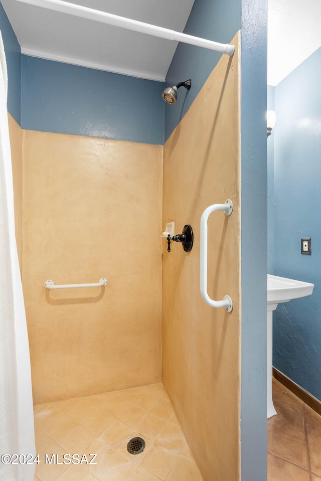 bathroom featuring tile patterned floors and walk in shower