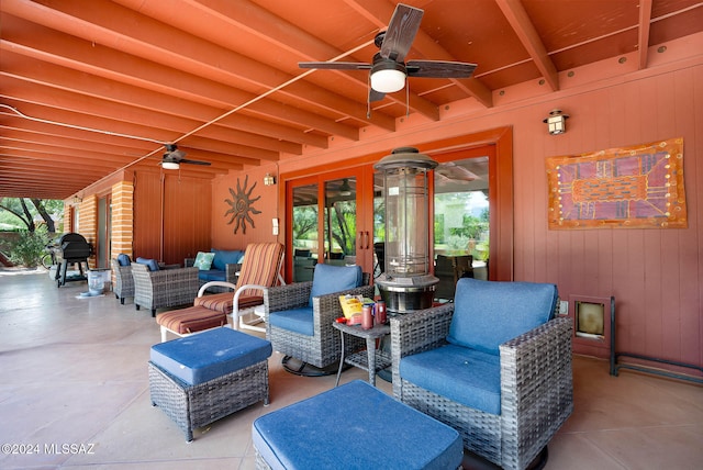 view of patio / terrace featuring an outdoor living space, french doors, and ceiling fan