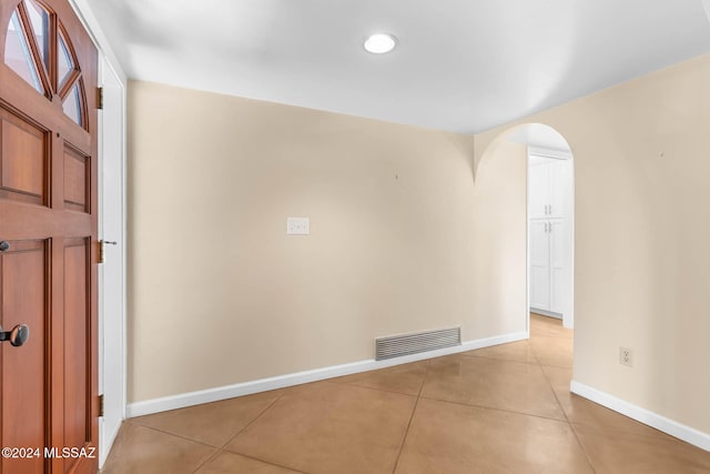 view of tiled spare room