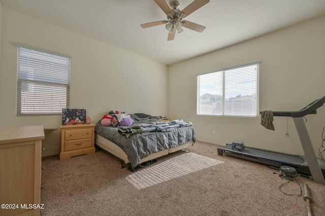 bedroom with carpet floors, baseboards, and ceiling fan