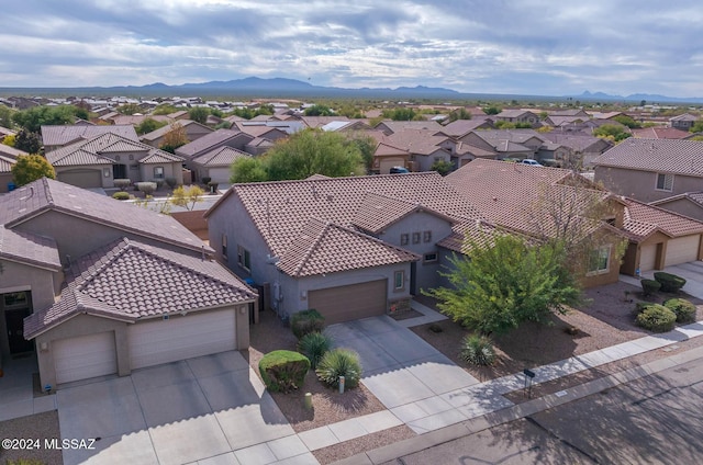 aerial perspective of suburban area featuring mountains