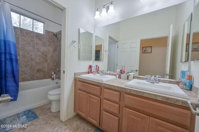 bathroom with toilet, tile patterned flooring, shower / tub combo with curtain, and double vanity