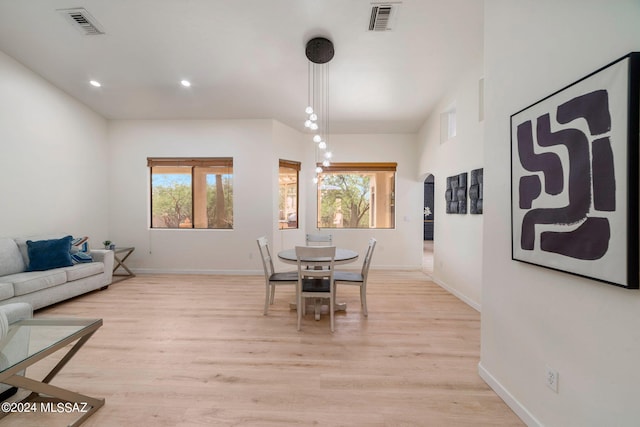 dining room featuring light hardwood / wood-style flooring